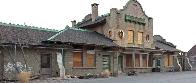 Rhyolite Train Depot, Behind: Tom Kelly bottle house