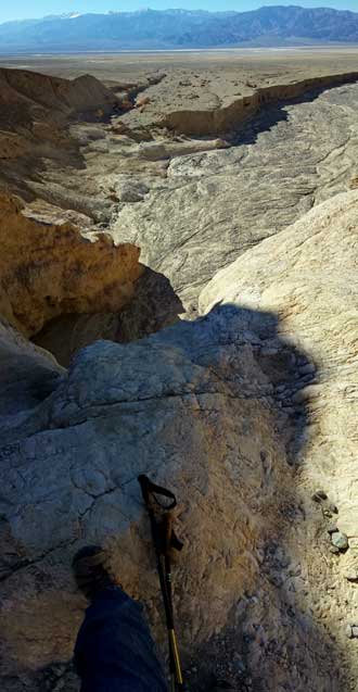 My foot at the top of the dry fall, mouth of Gower Gulch, Behind: Gwen exiting Gower Gulch at the mouth