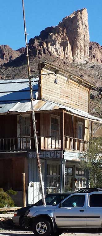 The natural beauty surrounds the town, Behind: Oatman postoffice