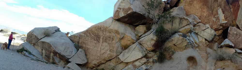 Hiking into Grapevine Canyon, Behind: Gwen finds the first petroglyphs in the canyon