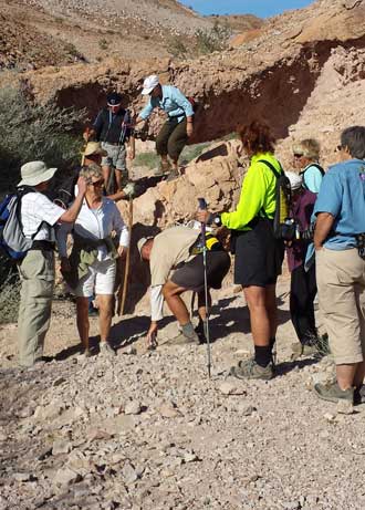 The group arrives at the natural bridge, Behind: Clowning around the natural bridge