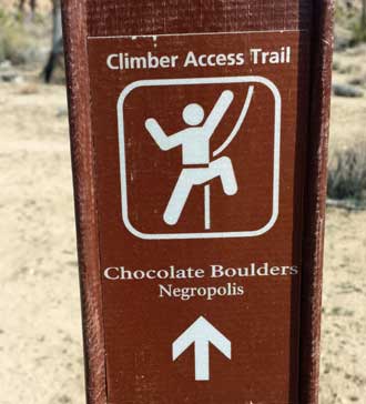 This appears to be a park especially for the rock climber, Behind: Rock climbers enjoying the day