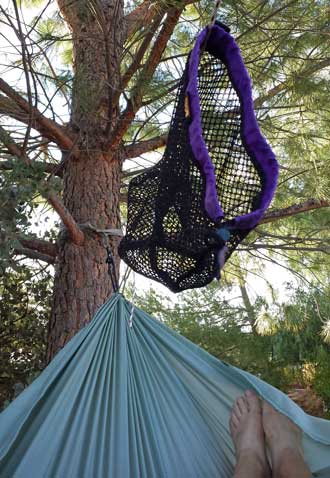 The pack sack doubles as a hanging storage loft, Behind: Laying diagonally without a ridgeline