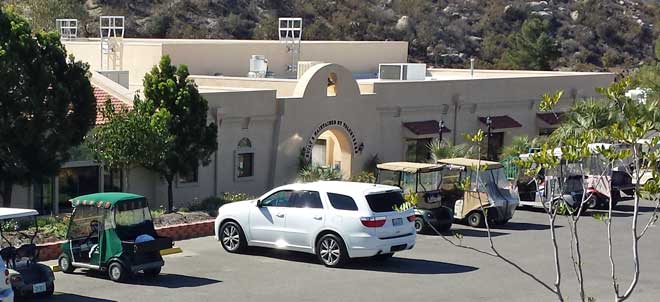 The exterior of the club house, Behind: Panorama of the park from the water towers