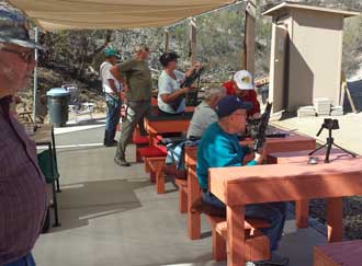 The air gun range, Behind: A live band and free meal the last day of the month