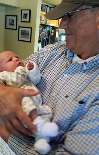 Grandpa with Lucy Harper for the first time, Behind: My daughter Mindy with her daughter Lucy Harper