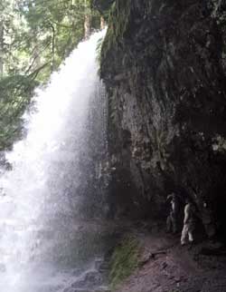 We get to walk behind Trestle Creek Falls, Behind: a panorama of the trail leading to the falls. 