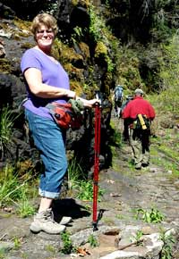 Gwen near the end of the trail, Behind: Finally a river level view