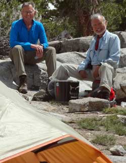 Merle and Katchan in our "kitchen", Behind: Rae Lakes campsite