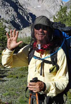 I finally use my mosquitoe head net, Behind: view of the long valley leading to the King River