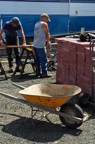 The patio work has begun, Behind: a wider view