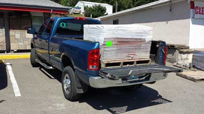 3500 lbs in the pickup bed, Behind: Almost done with the main project