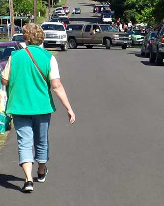 Walking the Oakland city wide garage sale, Behind: Probably 100 booths