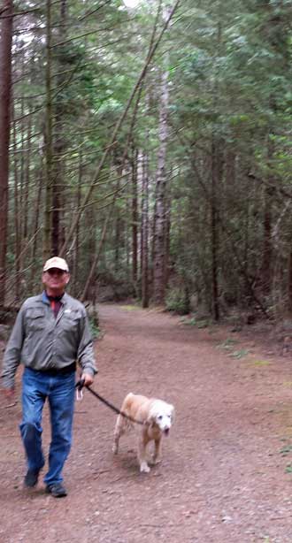 Morgam amd I on the trail, behind: Gwen overlooks a marshy area