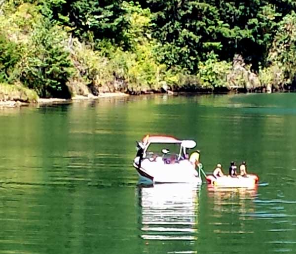 Skiers at Cooper Creek Reservoir