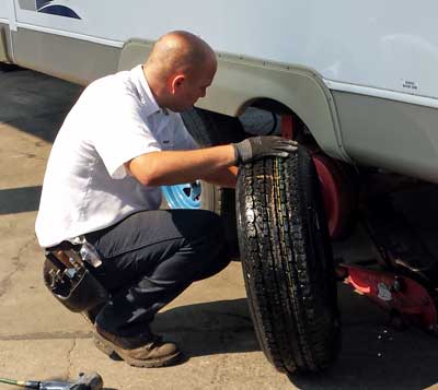 A failing tire took us to Les Schwab, Behind: transmitting sensor let us know the tire was losing air