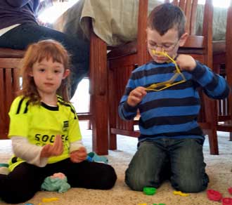 Cousins playing games at the birthday party