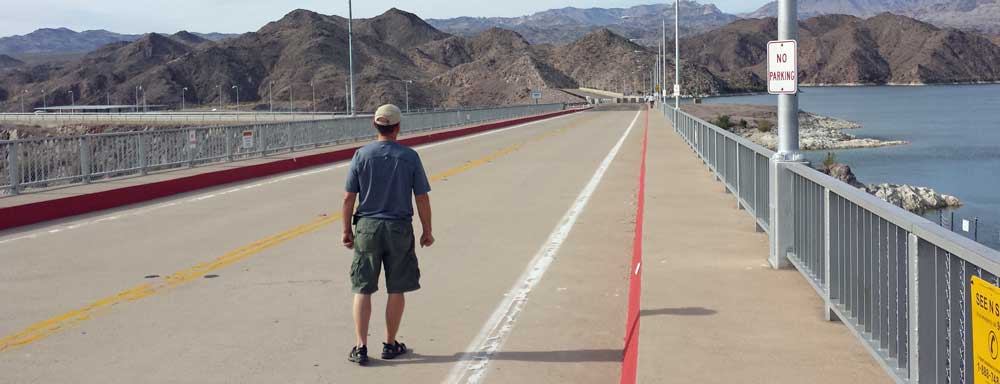 Hike across Davis dam,  Behind: power generating at Davis Dam