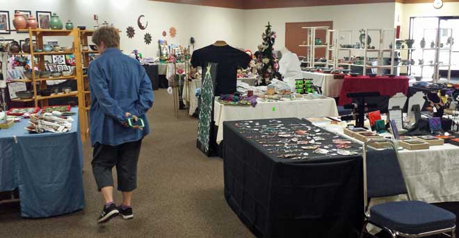 Gwen interested in some of the Arts and Crafts, Behind: Library and bookstore, Mojave Community College