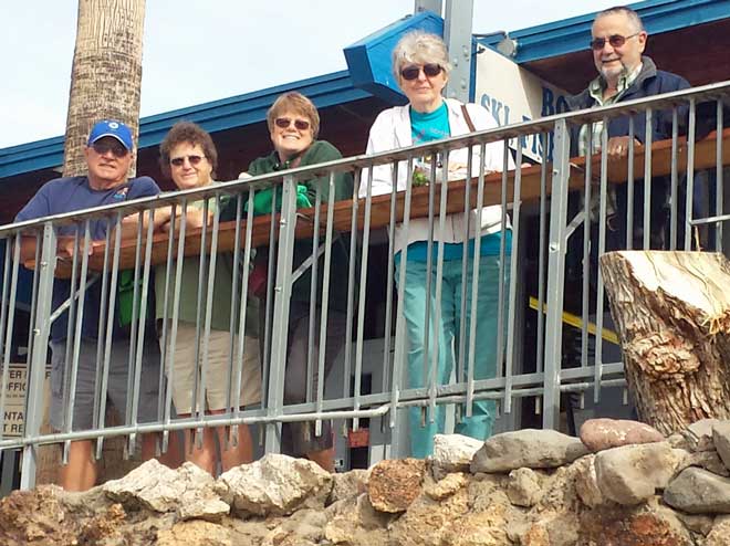 Our group ready for a boat ride, Behind: walking during a desert sunset