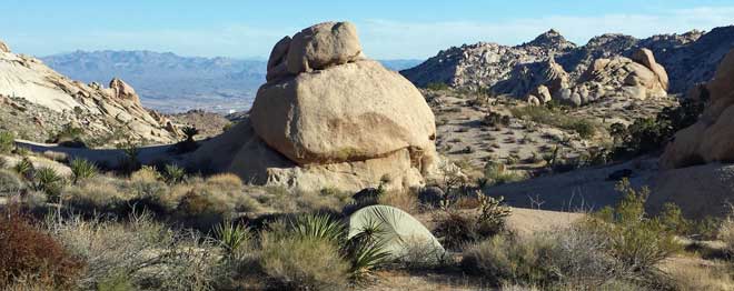 The view of Laughlin and the Riverside Casino from my camping location, tent this side of the large rock, Behind: wider view