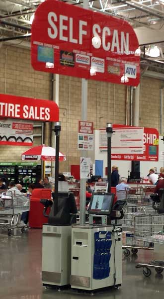 Costco self check-out, Behind: One REI in the Phoenix area