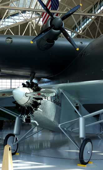 Spirit of St. Louis replica under Spruce Goose wing