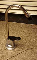 Filtered water tap, new to us