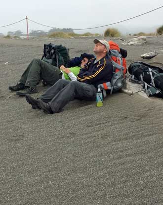 This soft sand is exhausting, nap time, Snowy Plover protected area is roped off.