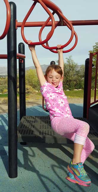 Chloe has learned the monkey bars