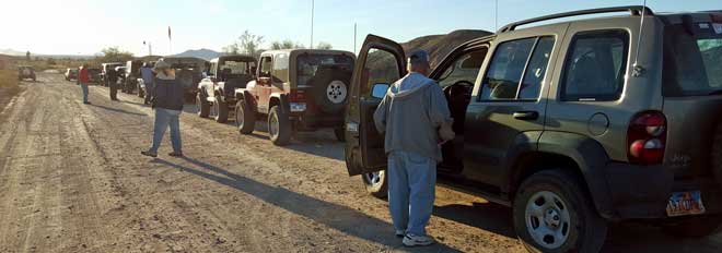 20 off road vehicles ready to start into the desert