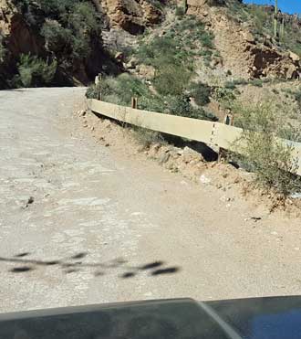 One lane road with not much of a guard rail