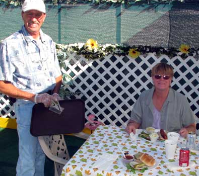 Steve, the owner, brings the meal to our table