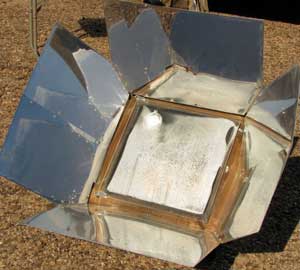 Solar oven baking the potatoes