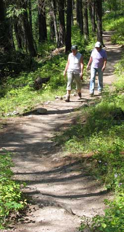 Kathy and Gwen are talking during the entire hike