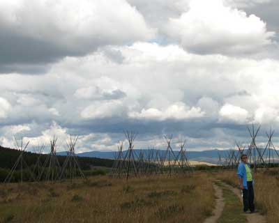 Walking into the Nez Perce tipi village along the Big Hole river