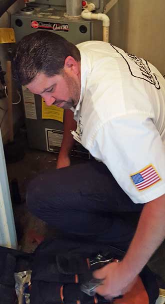 Phillip is fixing Mom's furnace