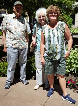 Gwen visiting with her friends Leon and Audry