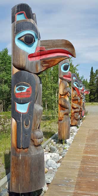 Tlinkit totum poles outside the heritage center gift shop