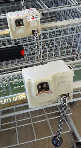 Locking grocery shopping carts, what a great way to teach shoppers to return their carts. 