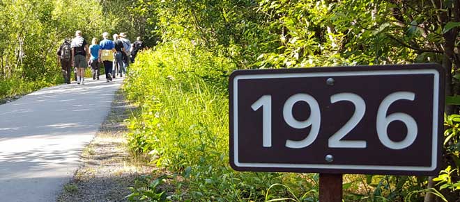 Hiking to the receding Exit glacier where year markers are placed to indicate where the glacer was on that year.