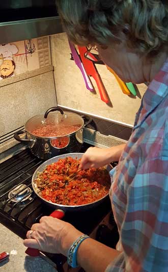 Gwen fixing chili for a staff prepared meal and our camp spot in Palmer, AK