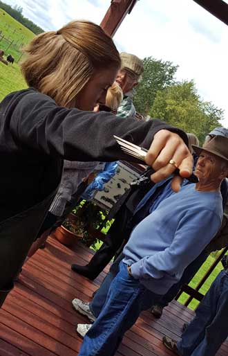 Our tour guide shows the "pick" used to comb the Qiviut from the Musk Ox