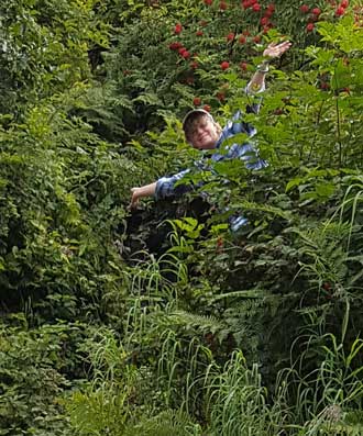 Gwen is fooling around at a nearby waterfalls