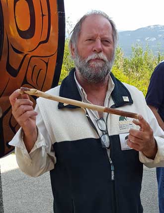 David, our tour guide, instructs us in the use of the atlatl