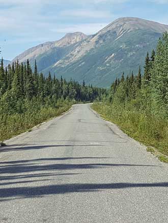 The Cassiar Highway, narrow two lane, paved, no lines