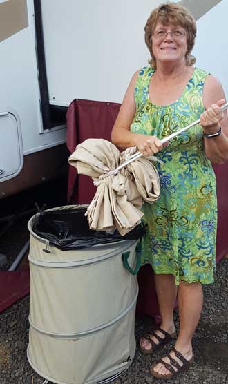 Gwen puts the driver and passenger side curtains in the trash