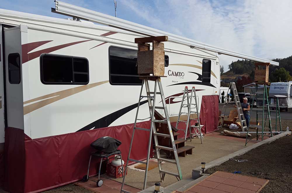 The roll awning is gone, the aluminum awning is being installed