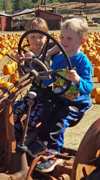 Chloe joins Noah on the tractor