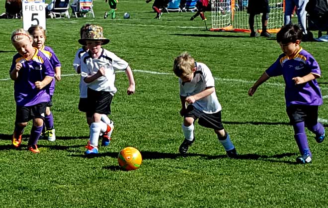 It's soccer day, Noah in the hat